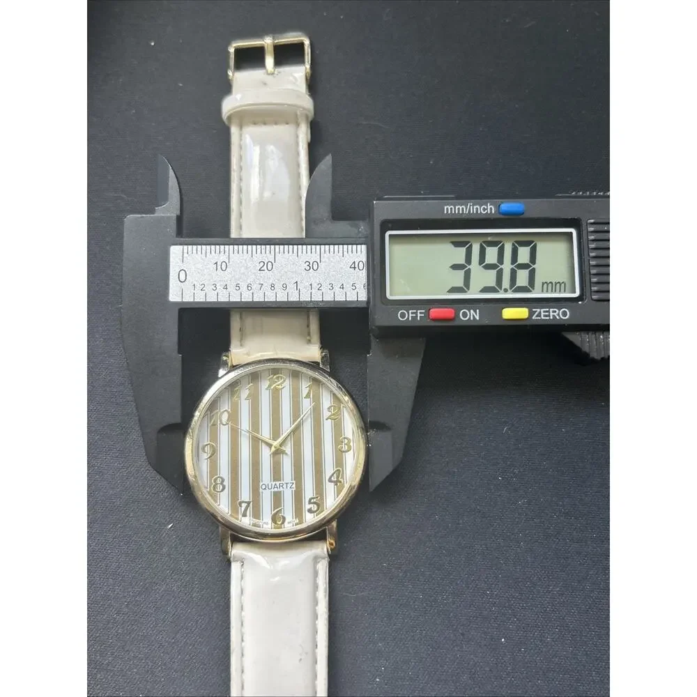 Gold Tone White Band Striped Dial Women’s Quartz Watch